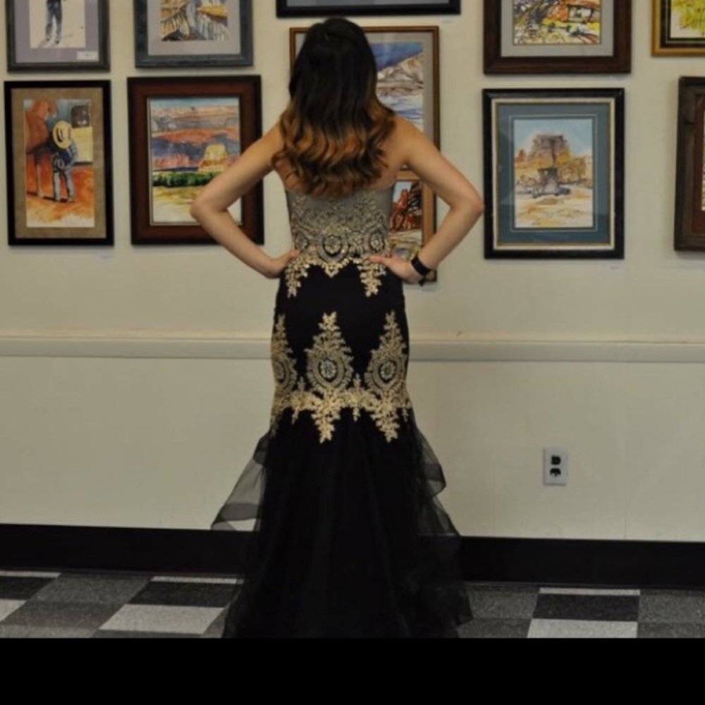 Gold and black formal gown